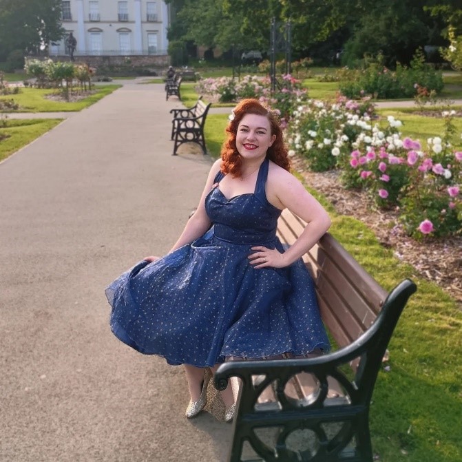 Female performer, performing at the bandstand