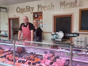 The owners of Boulton Family Butchers at their counter